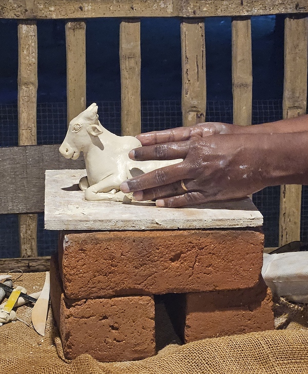 Cow with clay